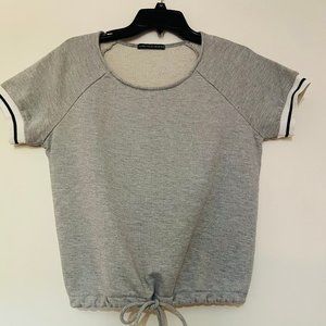 Harlowe and Graham grey sweatshirt with striped sleeves and cinched tie waist